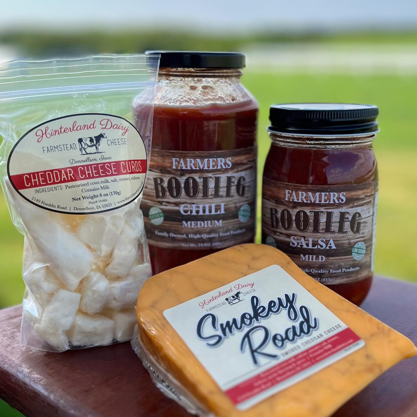 Blocks of cheese and bottles of sauce