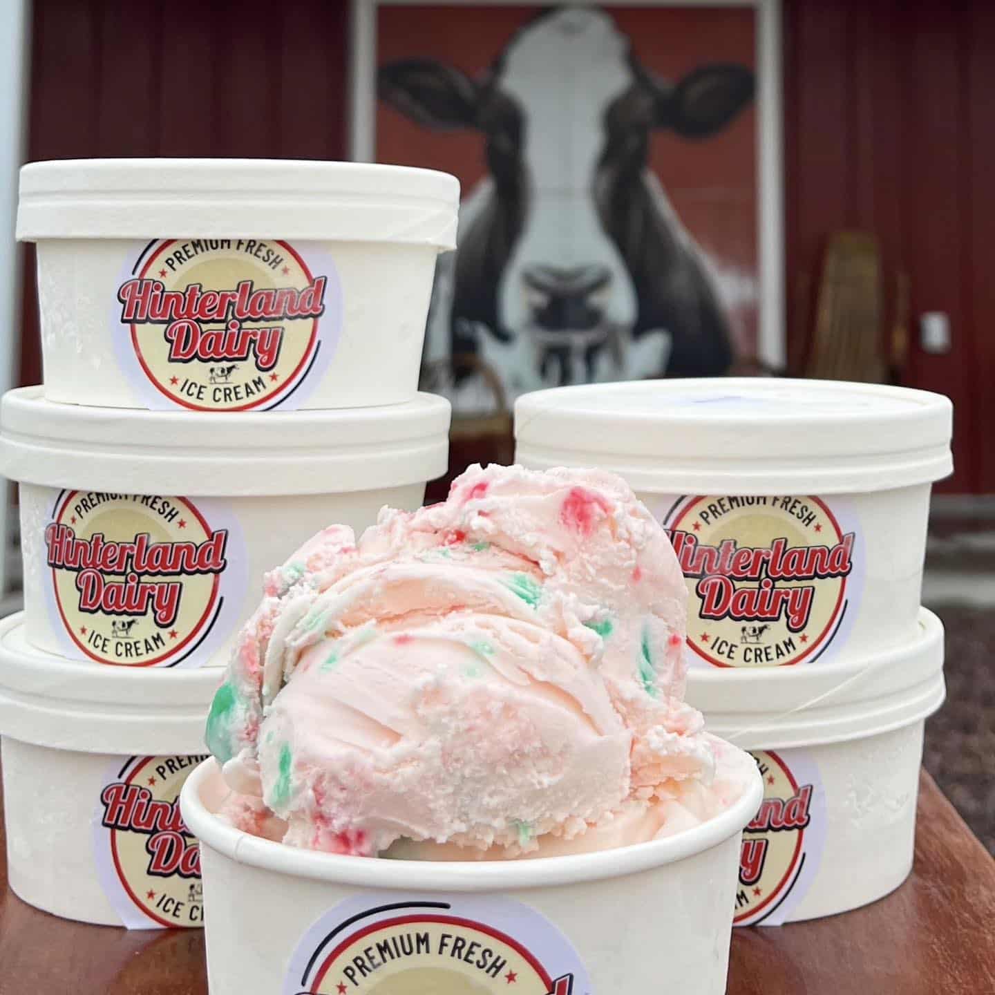 Pink ice cream in containers