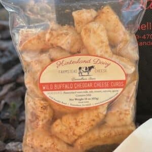 Wild Buffalo cheddar cheese curds in a 16 oz. package